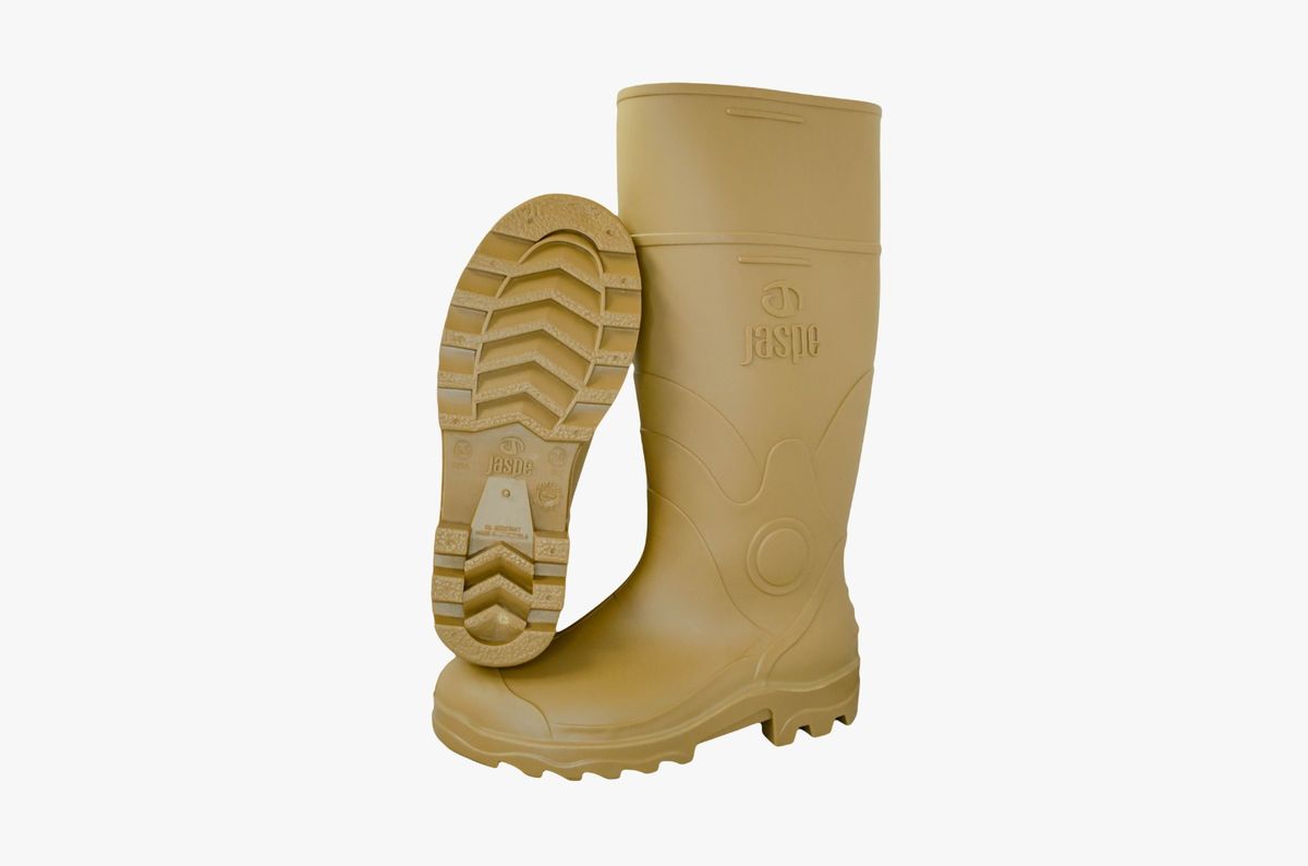 Bota de trabajo Jaspe color beige, vista lateral con suela visible sobre fondo blanco.